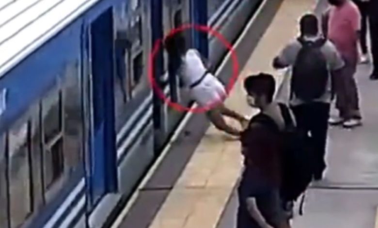 Shocking Video: Woman faints and falls under moving train