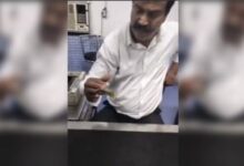 Photo of Railway employee shows cleanliness of hand at ticket counter, 500 note becomes 20 rupees in a blink of an eye