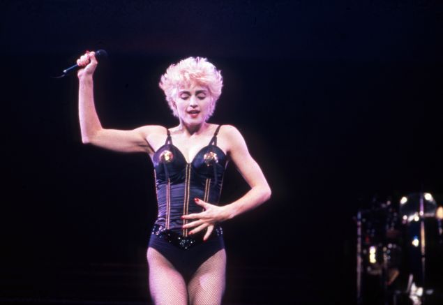 Madonna wearing a black bodysuit