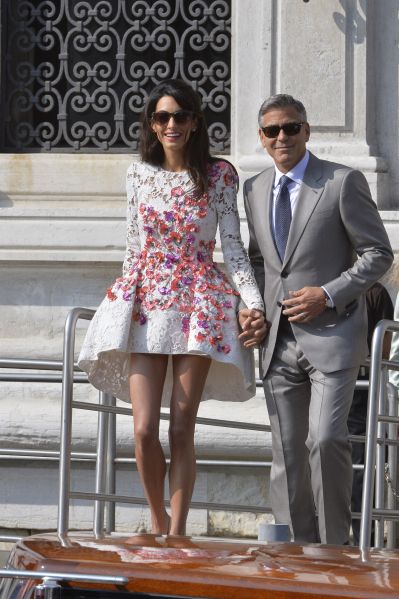 clooney wearing a high-low floral dress
