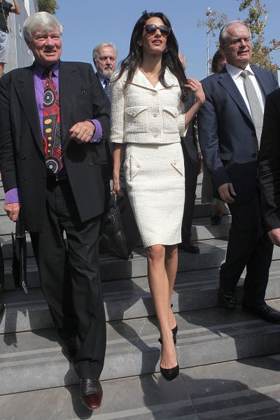 clooney wearing a white suit with skirt