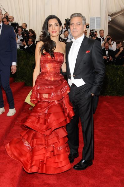clooney wearing a tiered red dress
